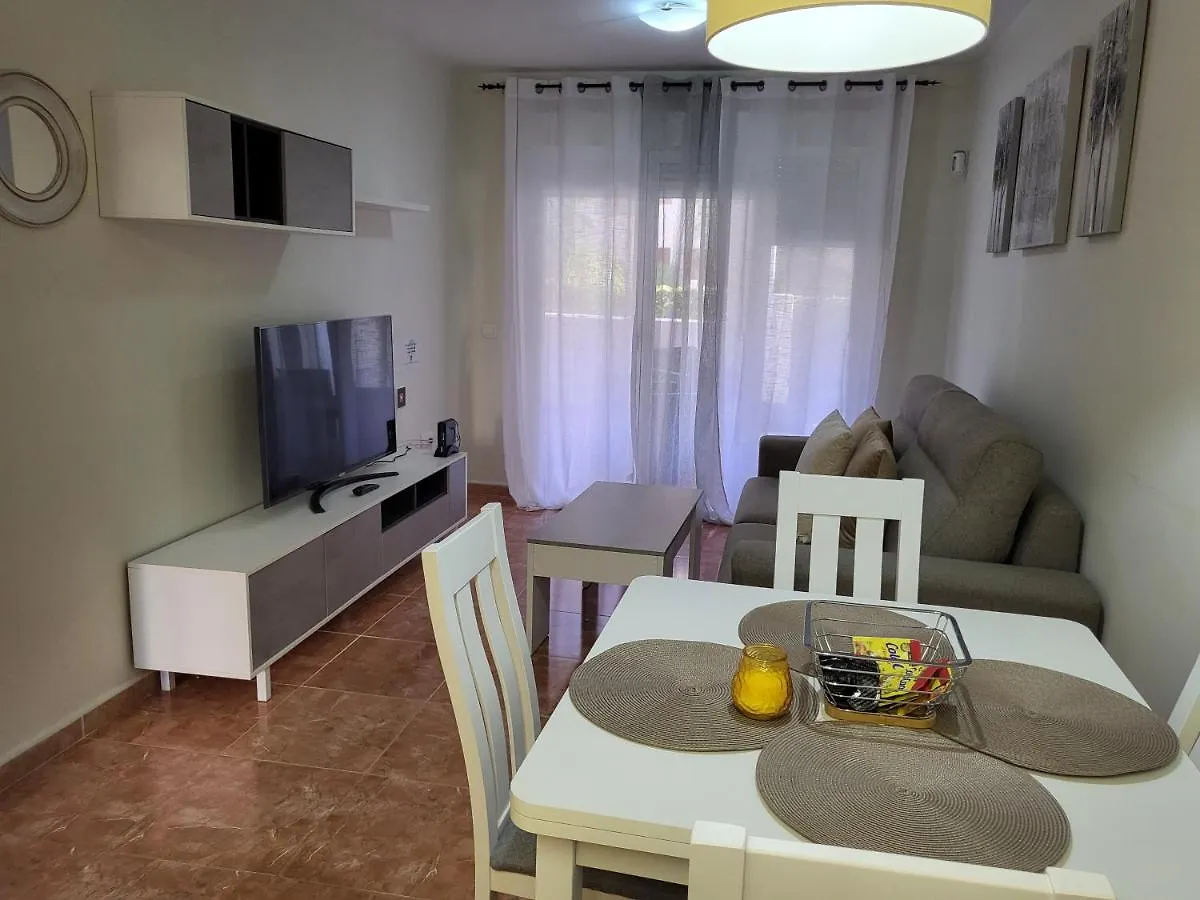 Apartamento Bajo precioso en primera línea de Vera-Playa con jardín y terraza!